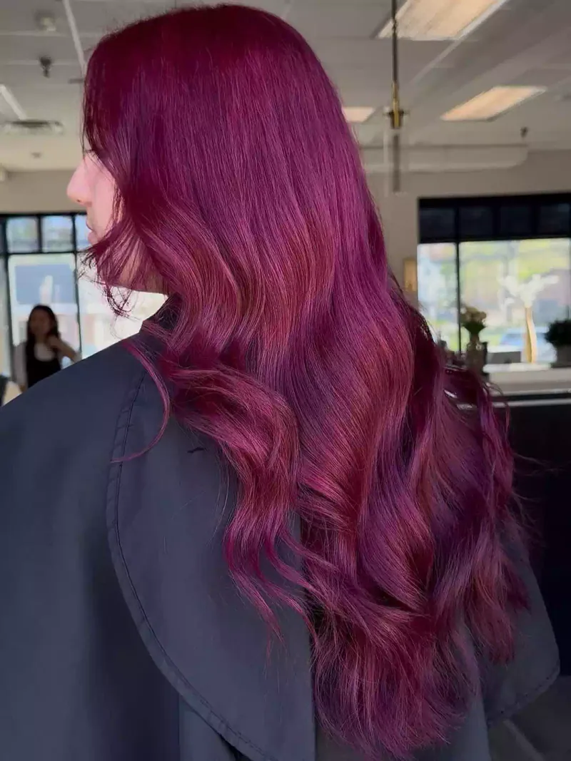 Vivid purple color on curly hair